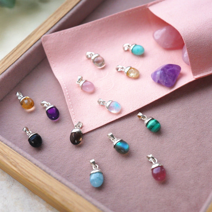 Berlock Trumlad Månsten Guld