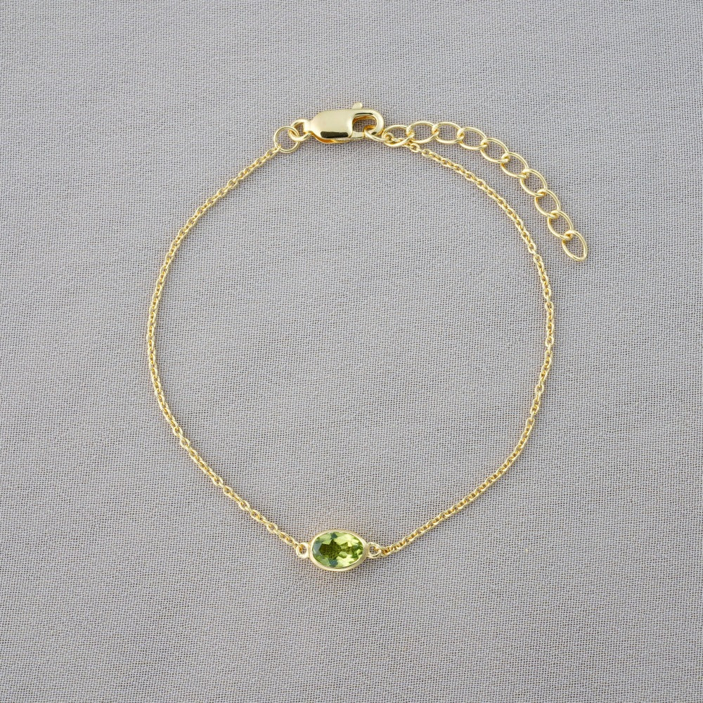 Armband med grön kristall Peridot i guld. Kristallarmband med Peridot i guld.